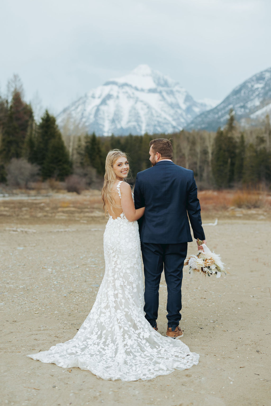 bride and groom portrait at glacier national park