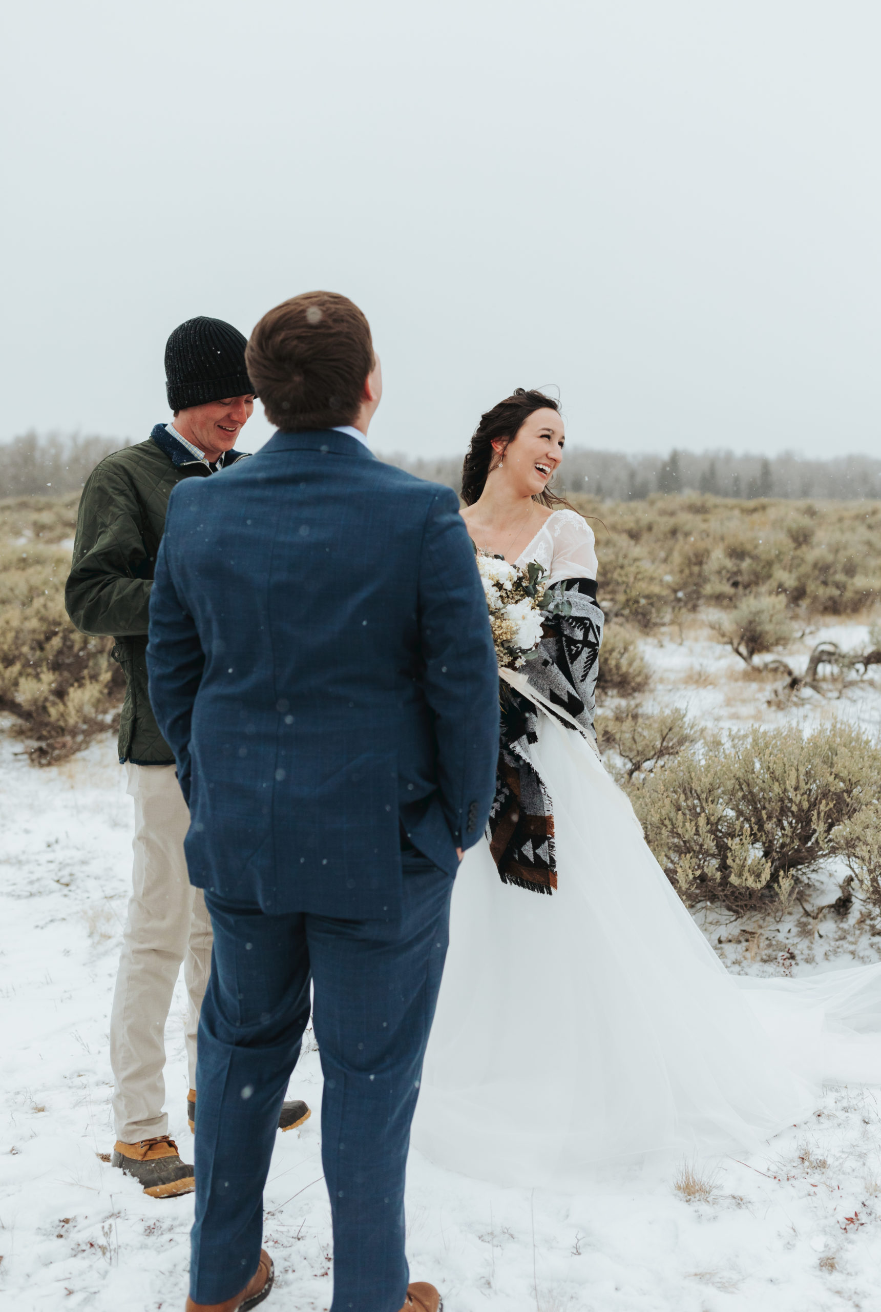 elopement ceremony in snow and mountains n grand teton national park 