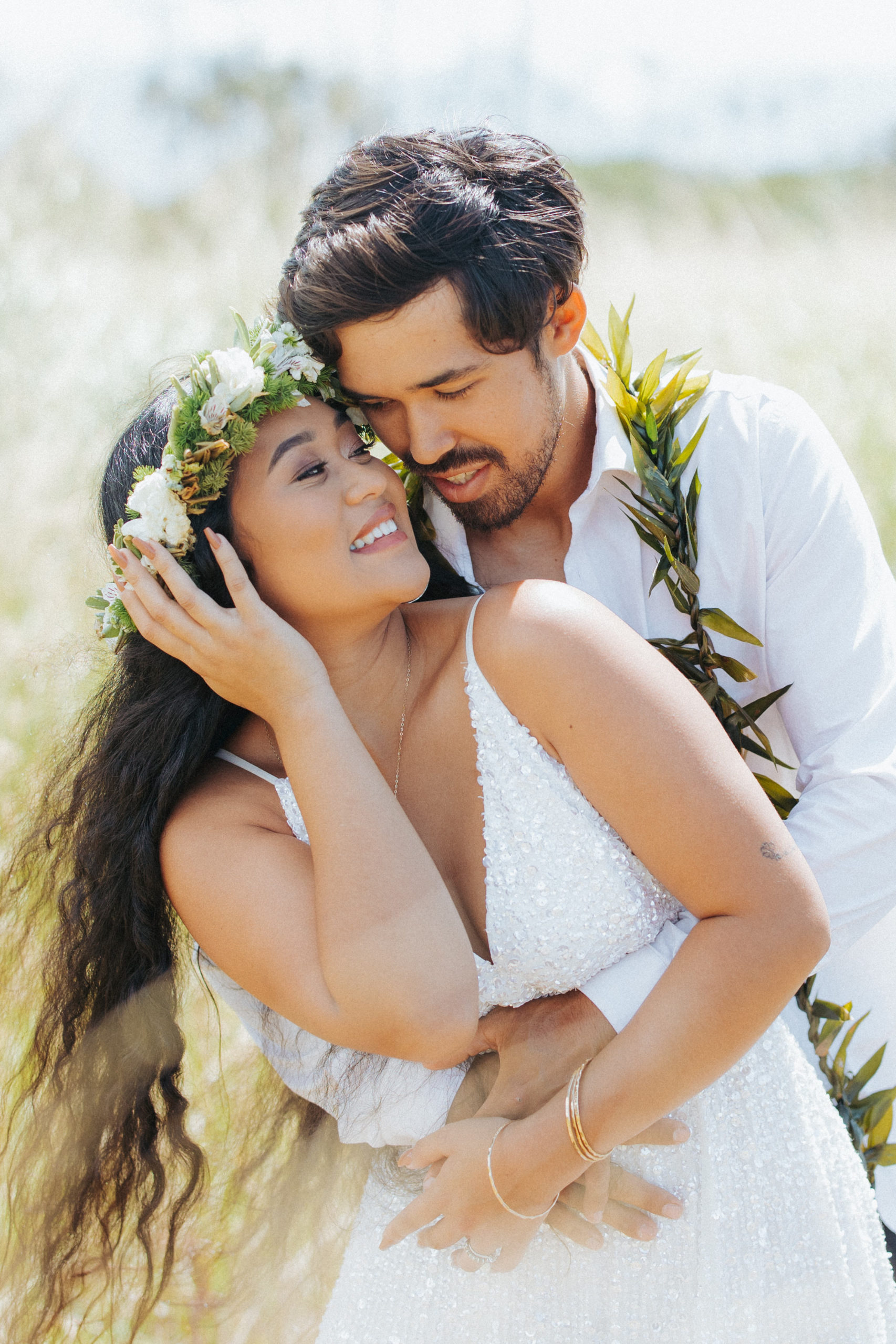 bride and groom hugging couple portrait in hawaii