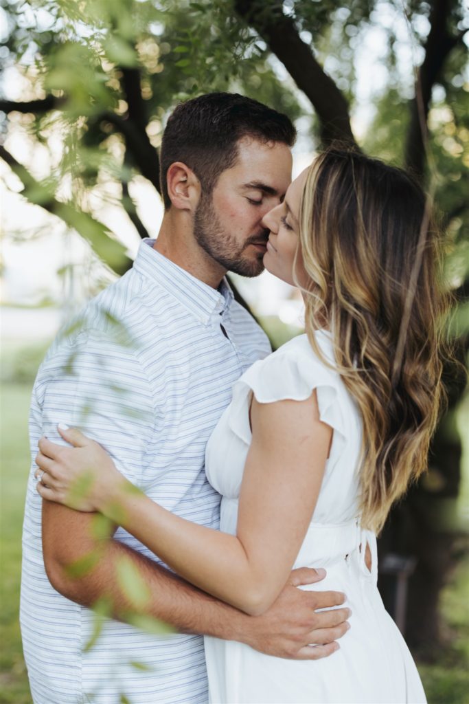 Couple engagement photos in tropical greenery