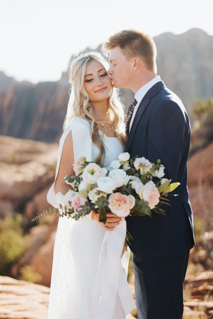 bride and groom canyon elopement portraits kissing
