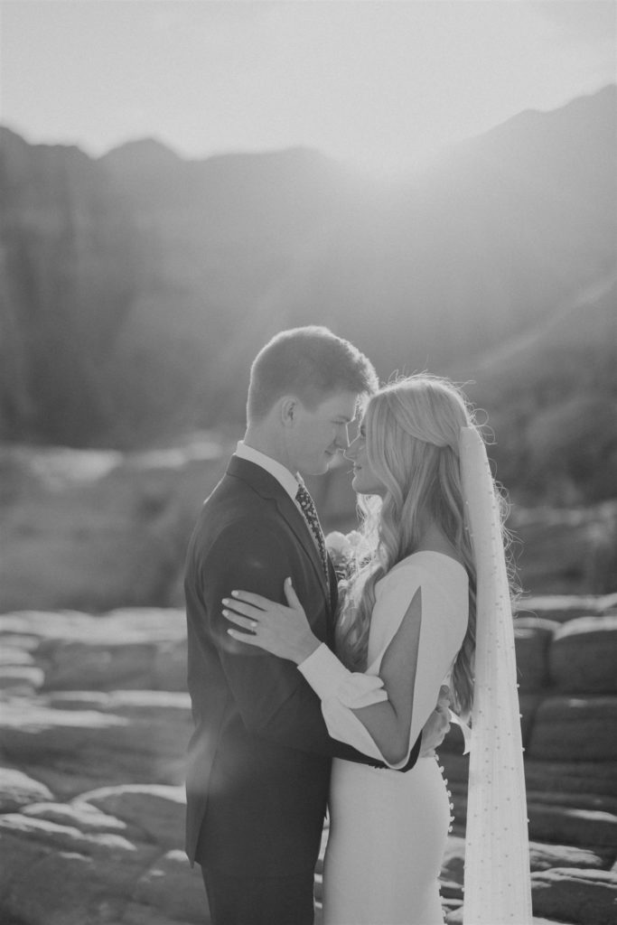 bride and groom canyon elopement portraits hugging
