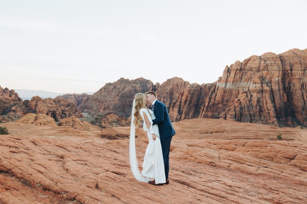 bride and groom canyon elopement portraits during an adventure session at Snow Canyon