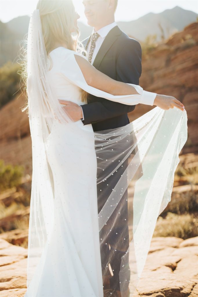Bridal elopement portraits with pearled veil