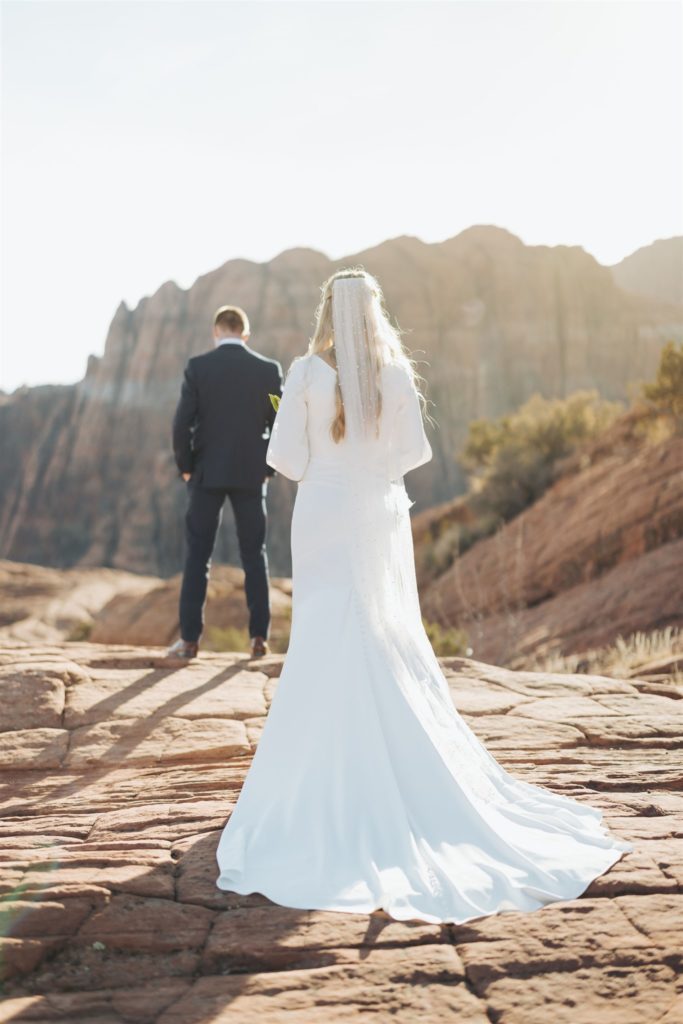 bride and groom canyon elopement portraits first look