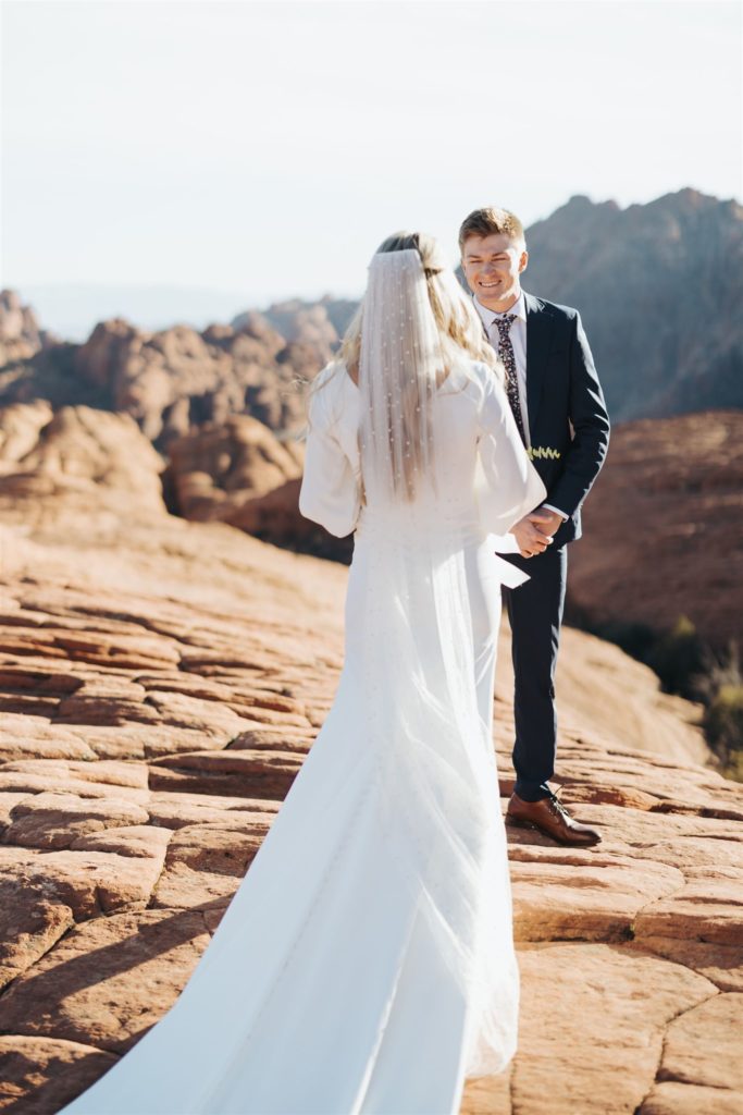 bride and groom first look during an adventure session at Snow Canyon
