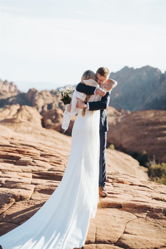 bride and groom first look during an adventure session at Snow Canyon