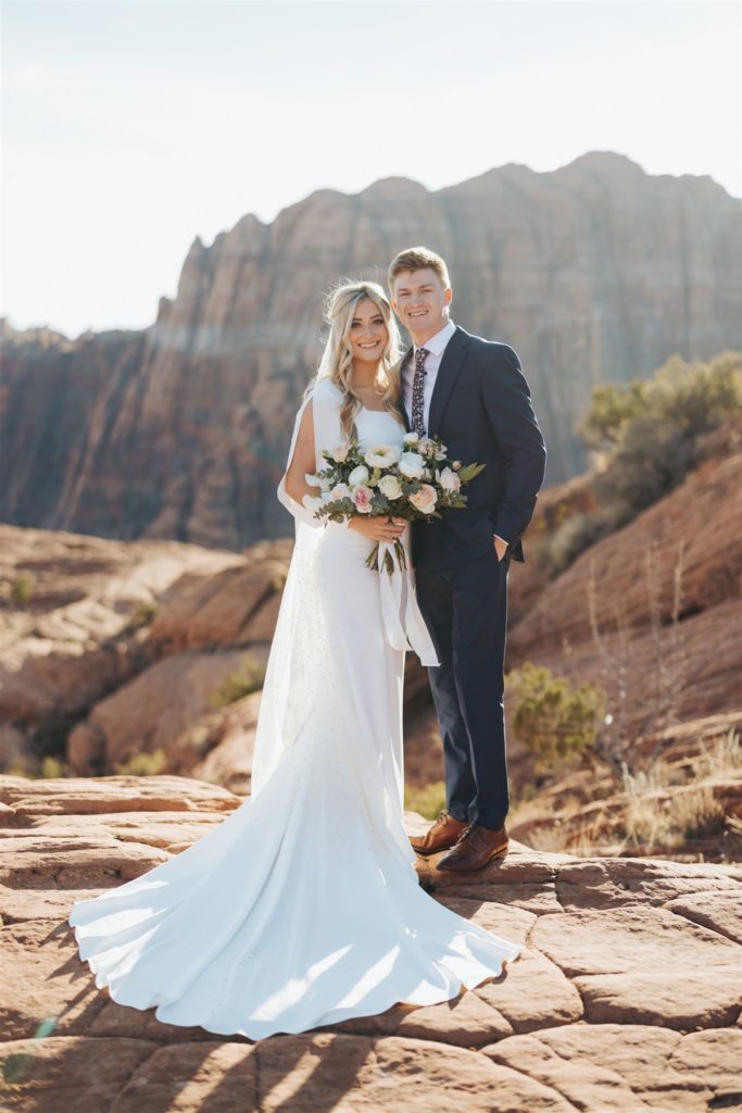 bride and groom during an adventure session at Snow Canyon