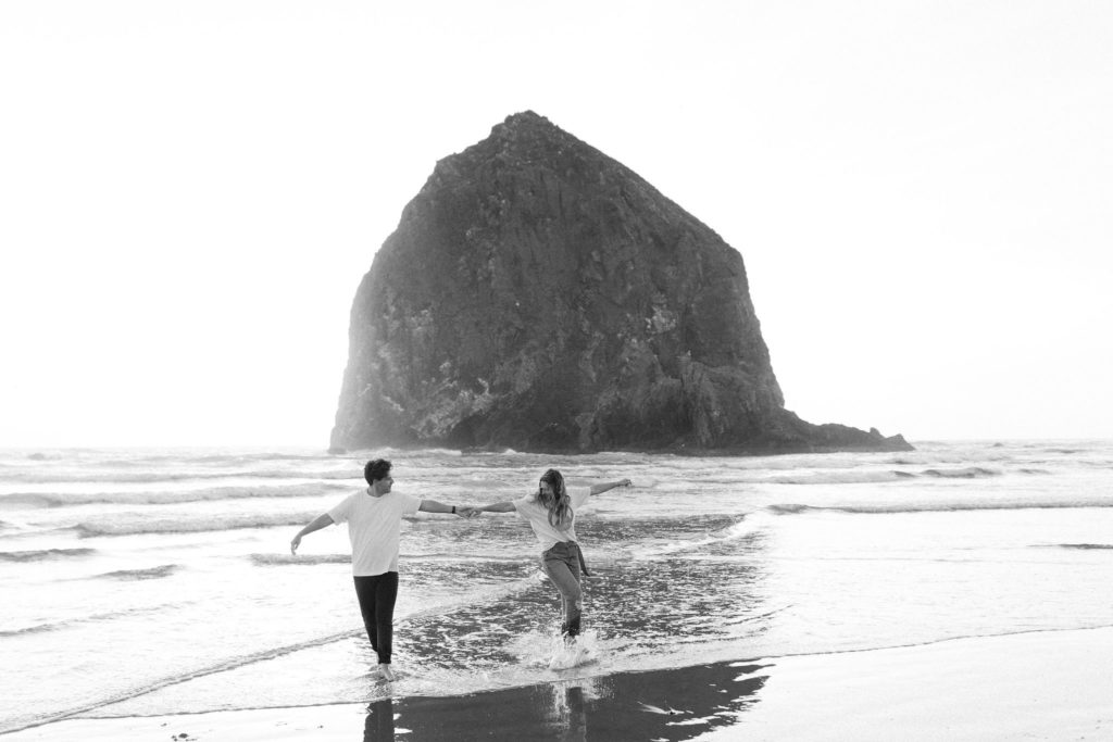 couple running on the beach