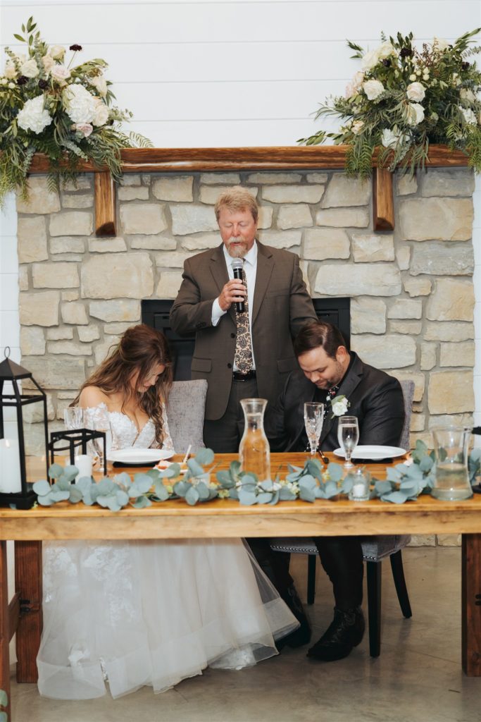 bride and groom reception toast