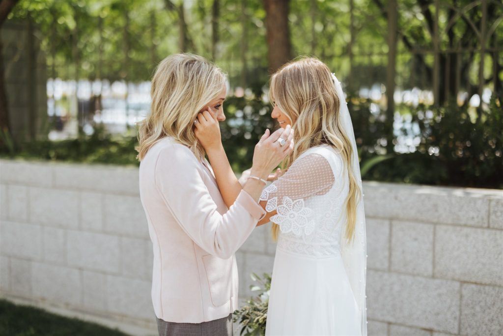 emotional bride first look with mother  at Draper Temple in Utah