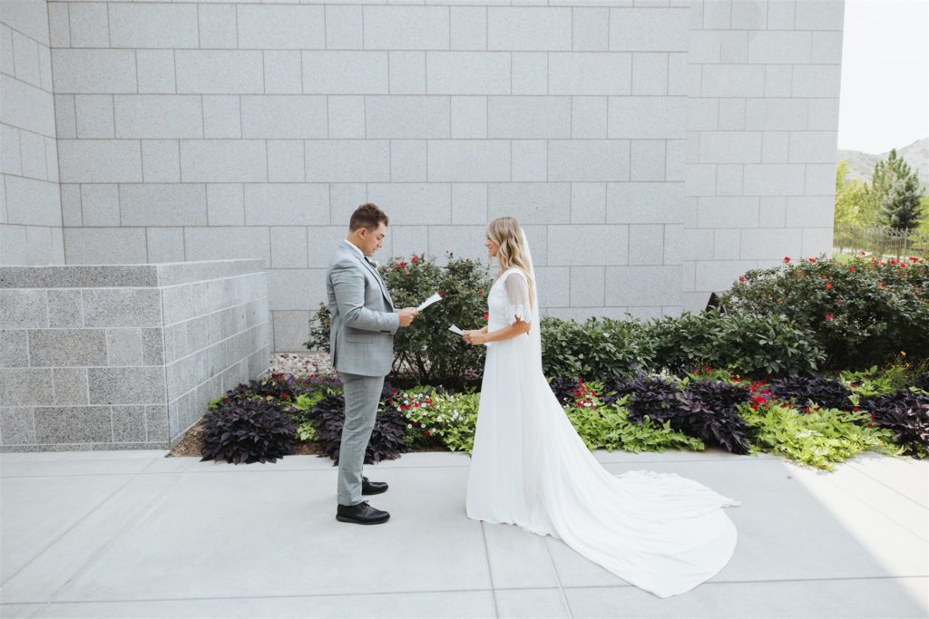 bride and groom exchanging vows at temple wedding sealing  at Draper Temple in Utah