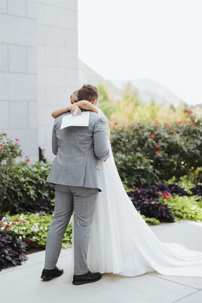 bride and groom exchanging vows at Draper temple wedding sealing in Utah