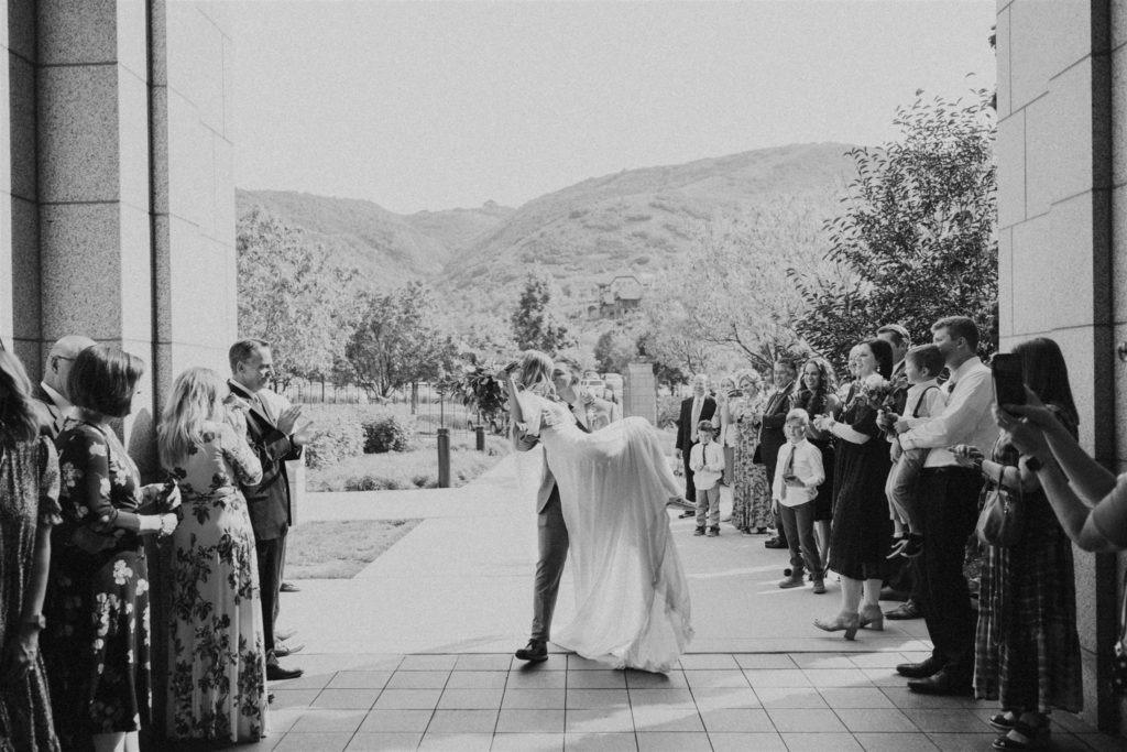 bride and groom temple wedding sealing exit  at Draper Temple in Utah