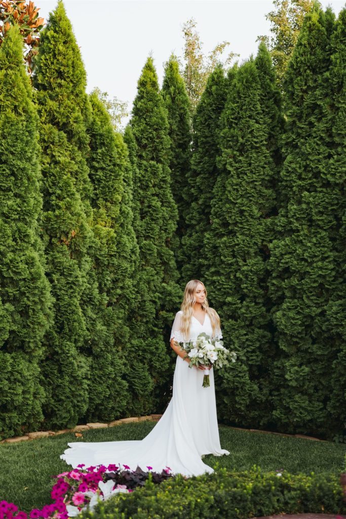 bridal portrait in front of trees at Le Jardin wedding venue in Draper Utah
