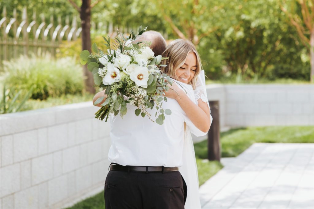 emotional bride first look with father  at Draper Temple in Utah