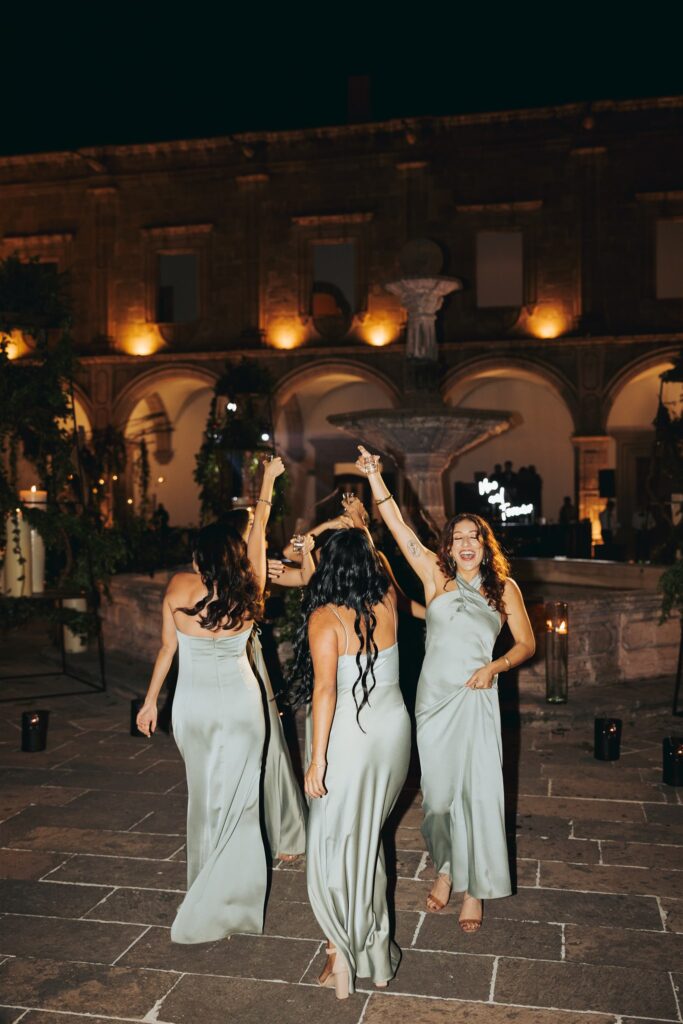 bridesmaids dancing at wedding reception