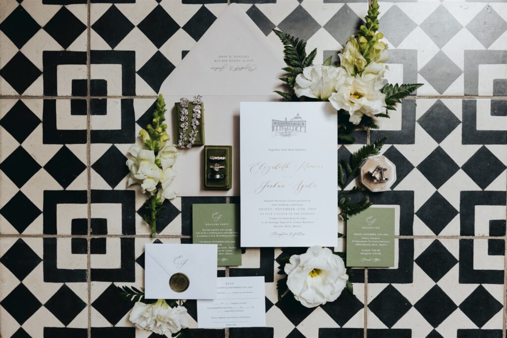 wedding details with florals and stationary