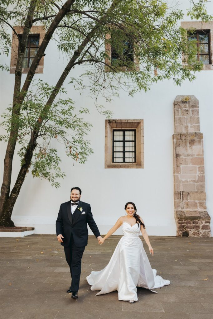 bride and groom walking wedding portrait during Mexico destination wedding 