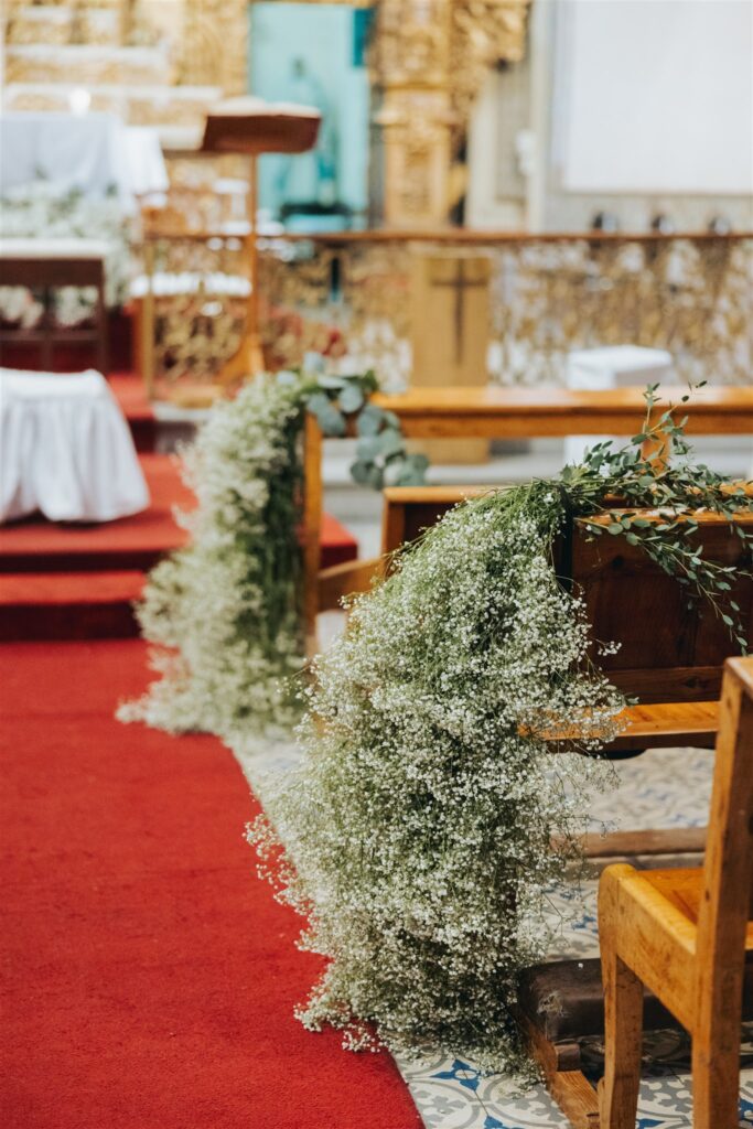 cathedral wedding ceremony in Morelia Mexico with babysbreath flowers