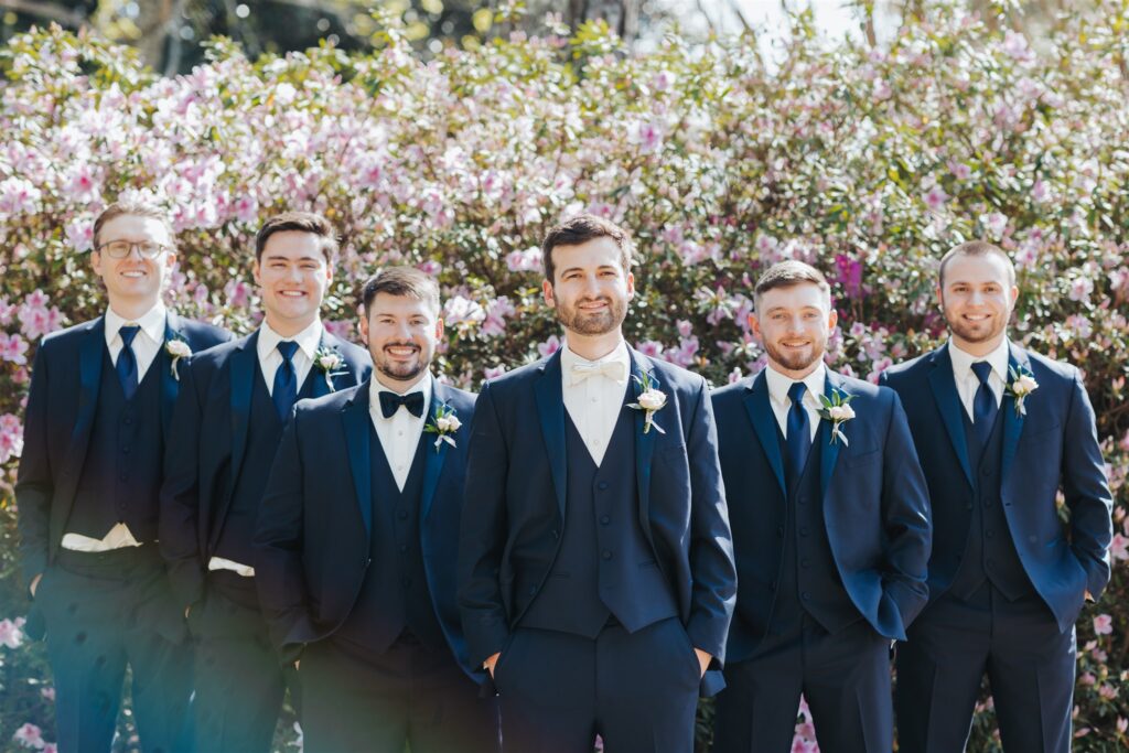 groomsmen and groom portrait with blue suits