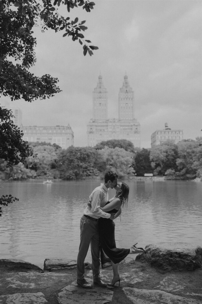 engaged couple hugging at central park in new york city