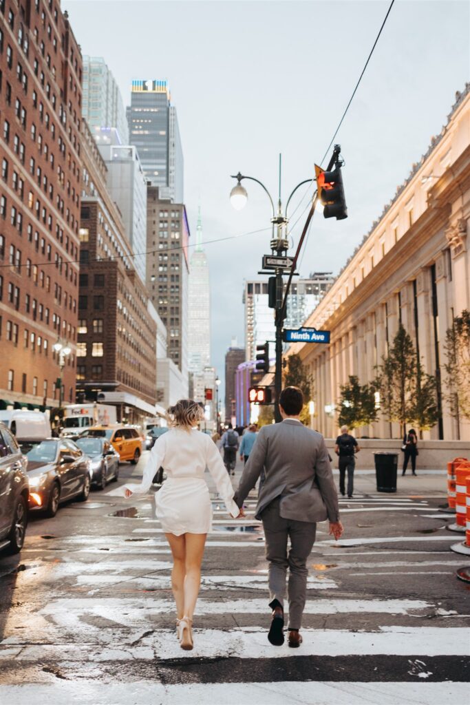 engaged couple walking in new york city