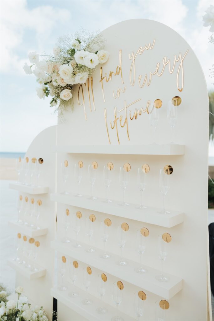 white, floral champagne wall arch