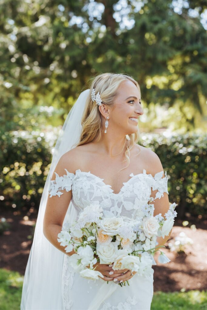 bride portrait with lace dress and bouquet