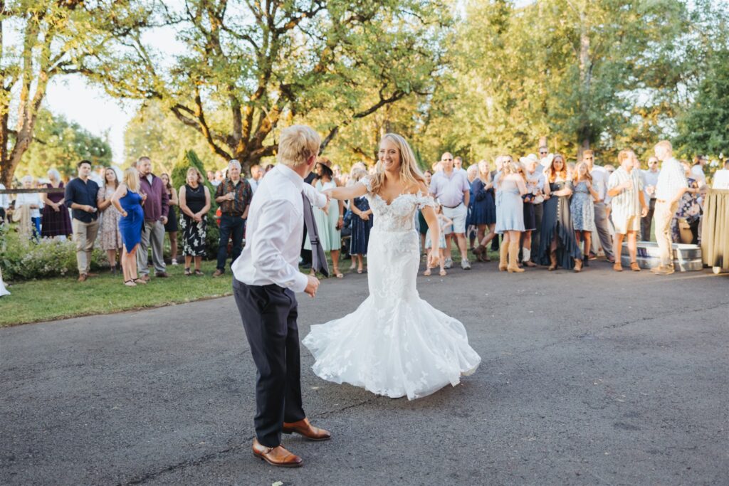 bride and groom first dance at garden party wedding