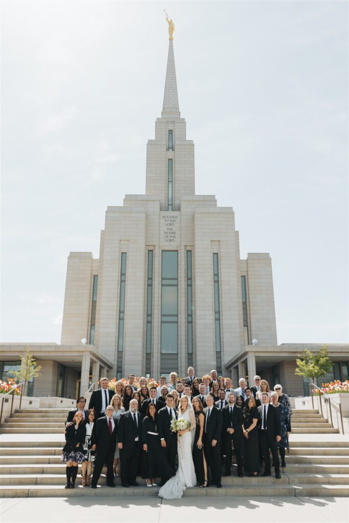 bride and groom Oquirrh Mountain Temple wedding sealing with wedding party
